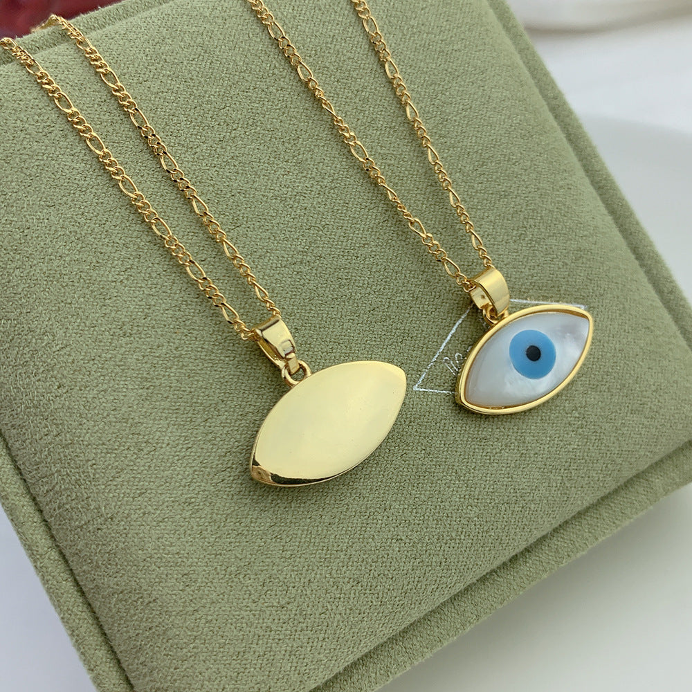 Handmade evil eye charm necklace with silver chain for spiritual defense