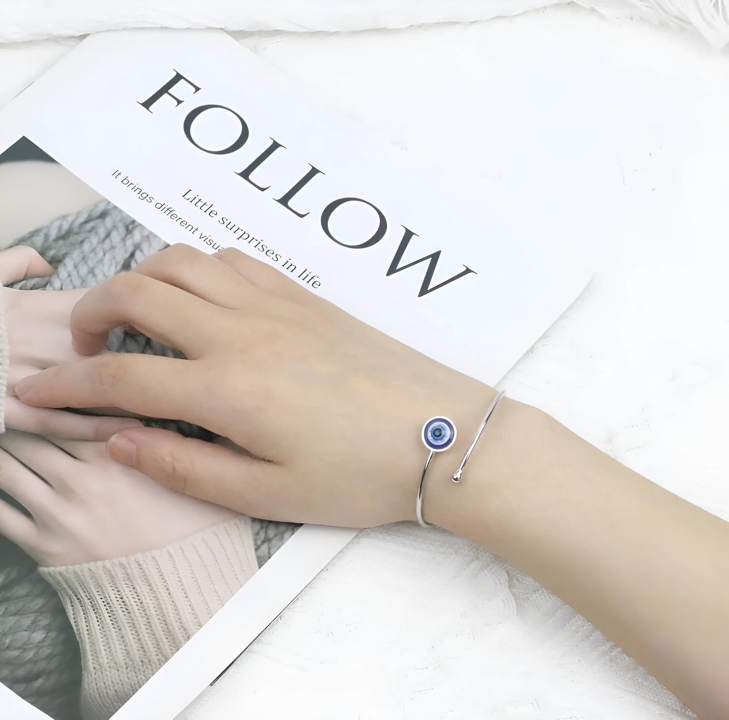 Stylish adjustable blue eye wrist bracelet symbolizing positive energy