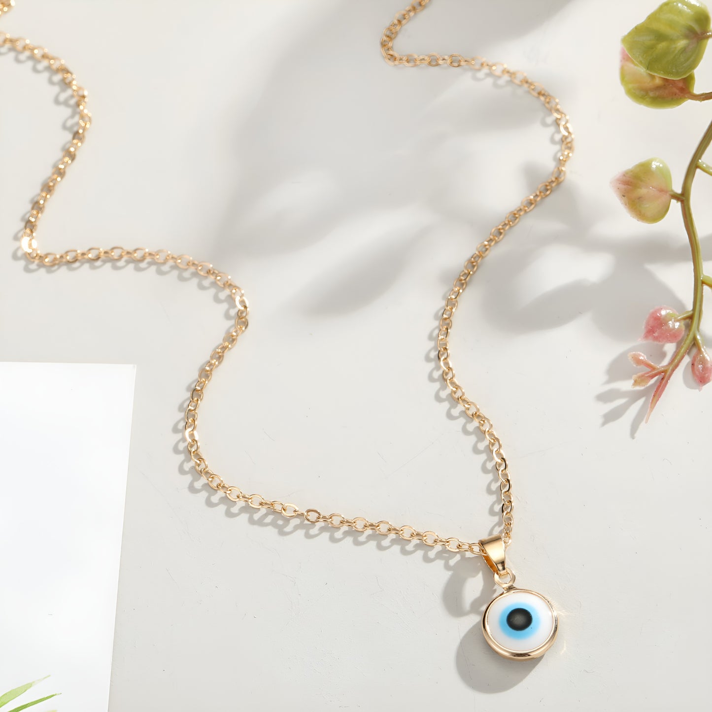 Elegant evil eye necklace with blue gemstone pendant and fine chain