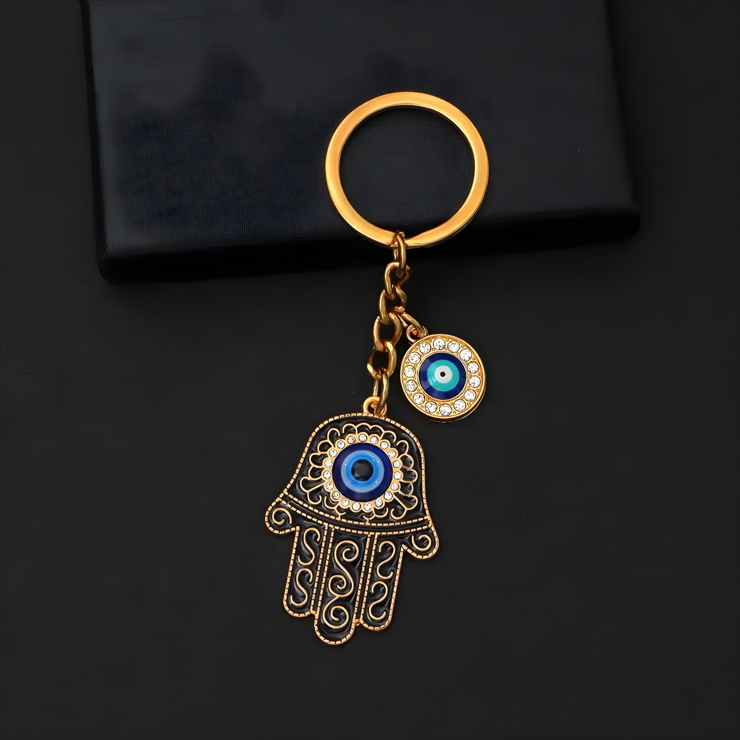 Lucky charm keychain with hamsa hand and evil eye for everyday protection