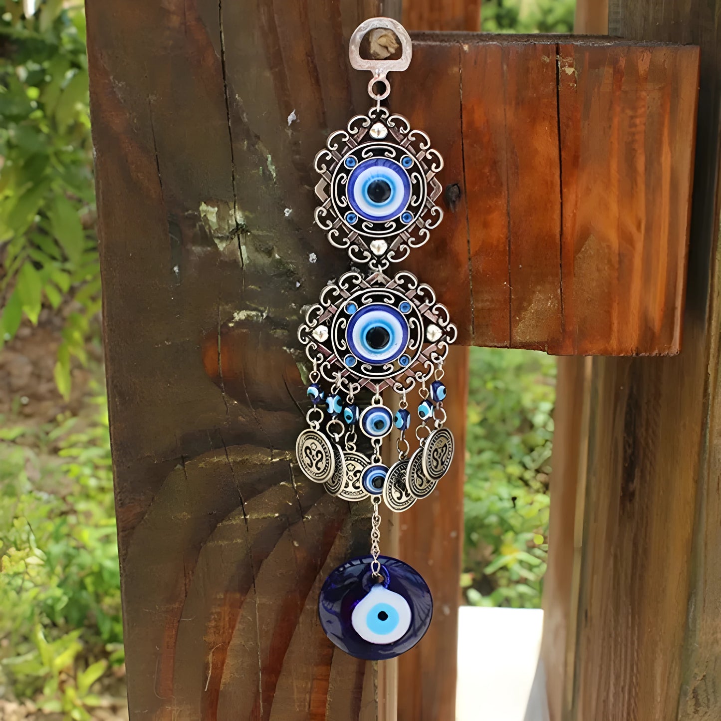 Blue evil eye wall decor with intricate design for warding off negativity