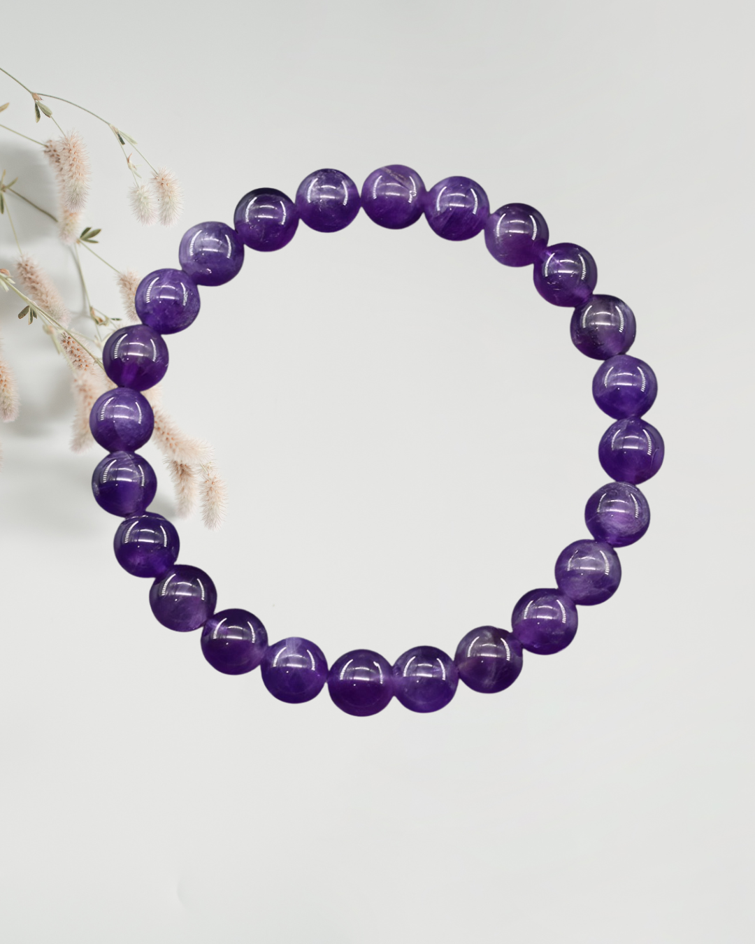 Elegant amethyst gemstone bracelet on elastic cord for daily wear