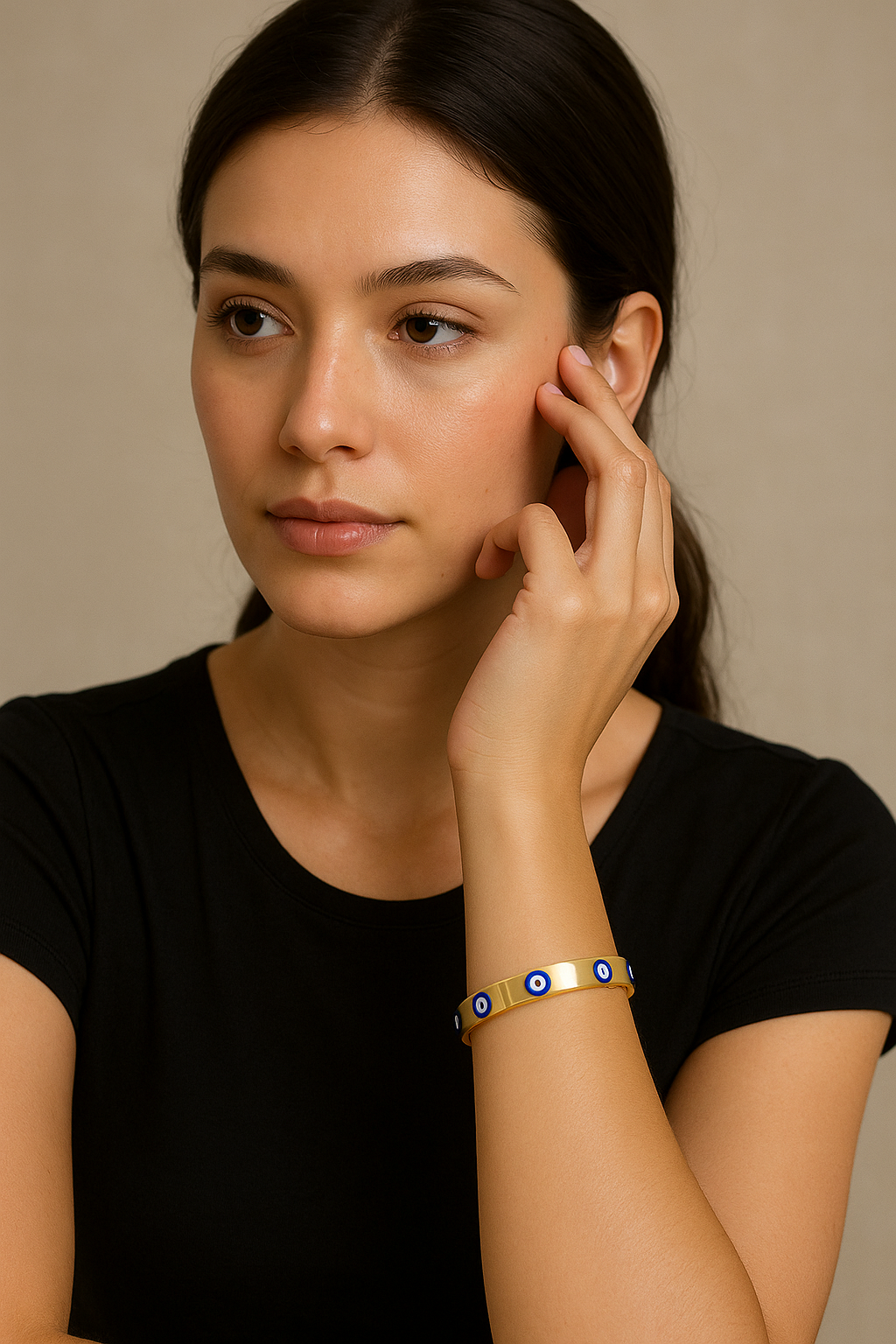 Handmade gold-plated evil eye bangle with protective charm for daily wear