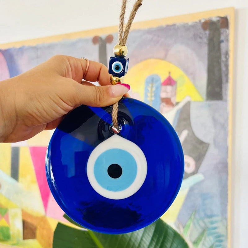 Traditional evil eye charm with vibrant blue bead to ward off bad luck