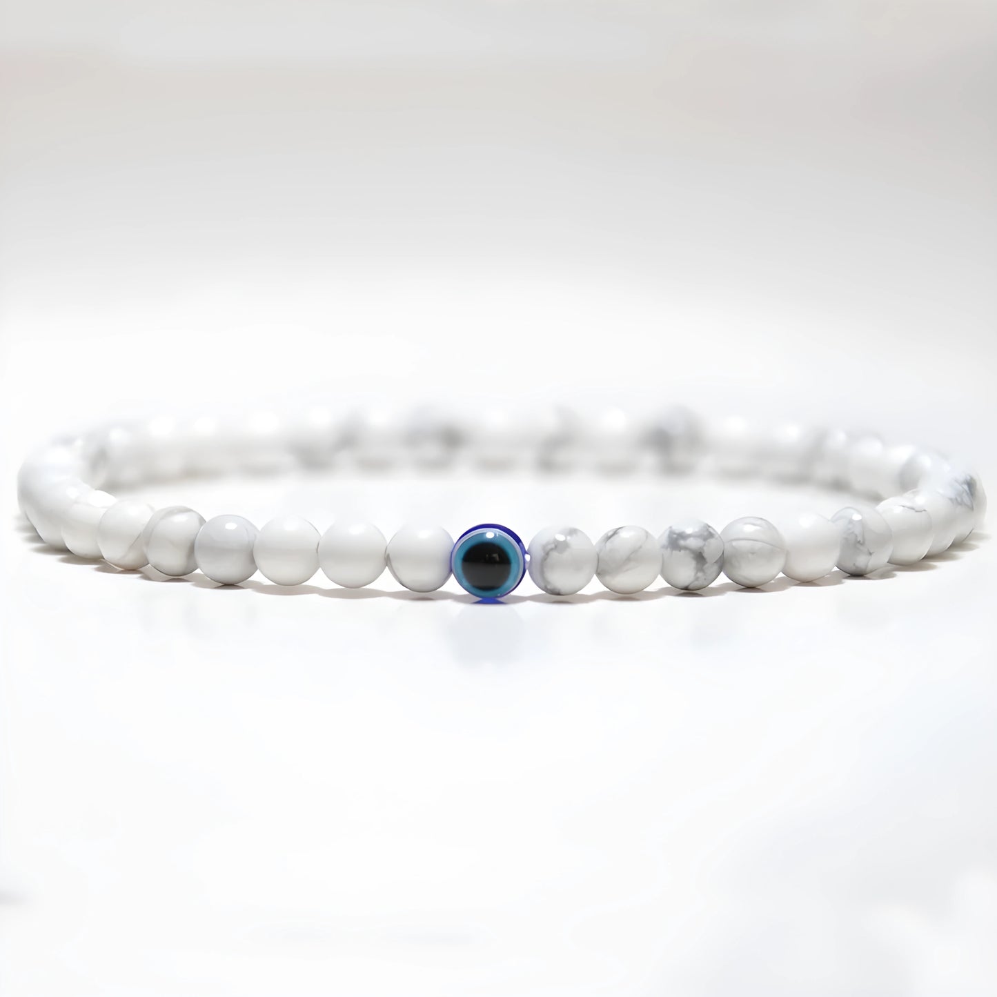 Handmade evil eye bracelet with black and blue beads for men