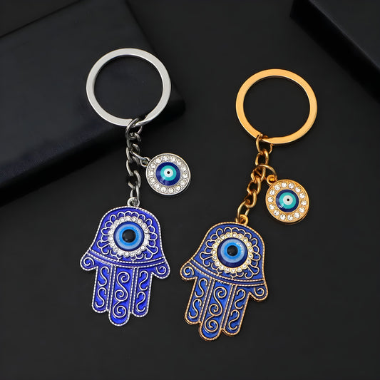 Hamsa hand and evil eye keychain for protection and good luck

