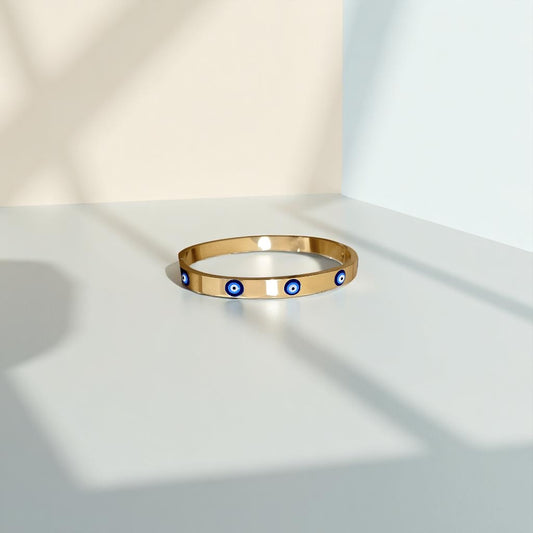 Elegant gold evil eye protection bangle bracelet for spiritual defense
